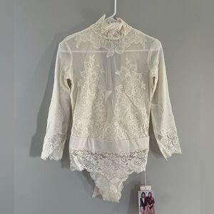 Free People We are HAH Take Hah Bow Bodysuit in La Creme